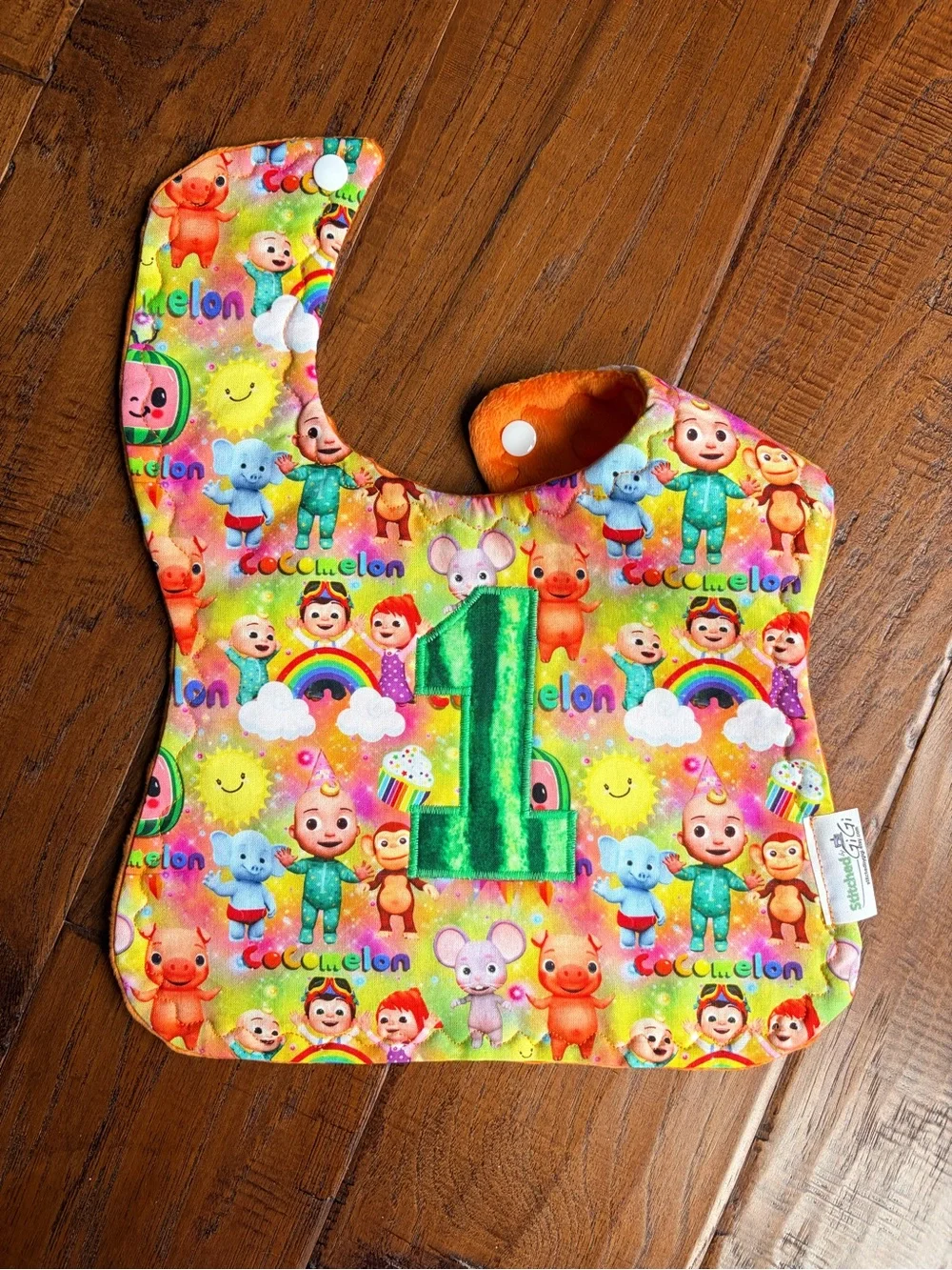 Colorful Cocomelon Character First Birthday Bib